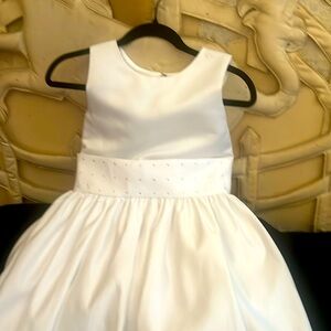Jr. Dress, white sequined belted middle, zipped button down with bow in back.
